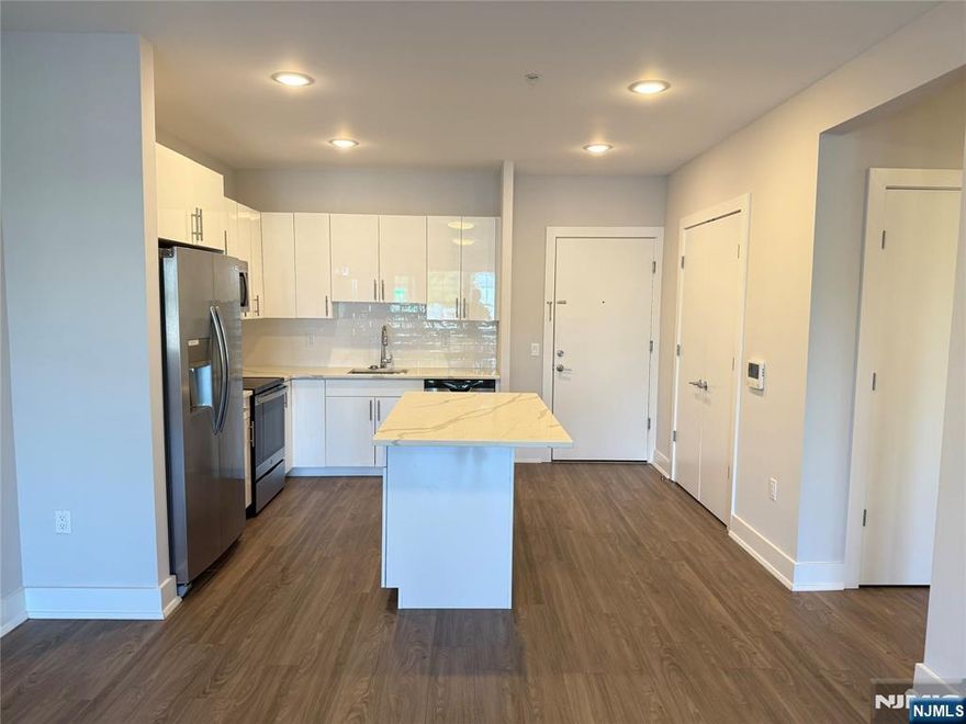 **ONE MONTH FREE on 13-month lease + one parking space included! - for occupancy commencing on or before 8/1/25!** Welcome to The Addison - Fort Lee's new luxury rental building offering a variety of upscale, spacious floor-plans. The Addison offers high-end residences fully equipped w/ modern kitchens w/ stainless steel appliances, quartz countertops, full islands & tiled backsplashes, open living/dining areas, shades on all windows, modern bathrooms & a full-sized washer & dryer in each unit. Exclusive 24/7 virtual doorman service for communications, package deliveries & access control via video intercom system linked to your smart phone. The Addison includes a large on-site fitness center including virtual touchscreen workout mirror, electric car charging stations & parking garage w/ direct elevator access to all residences for uncompromising security. Pet friendly - (25 lb limit) $500 pet fee + pet rent per month! Tenants pay ALL utilities! All amenities INCLUDED in the rent! PARKING: 1st space - $125/monthly (excluding promotion) ; Additional space - $100/monthly. Virtual tour available upon request!