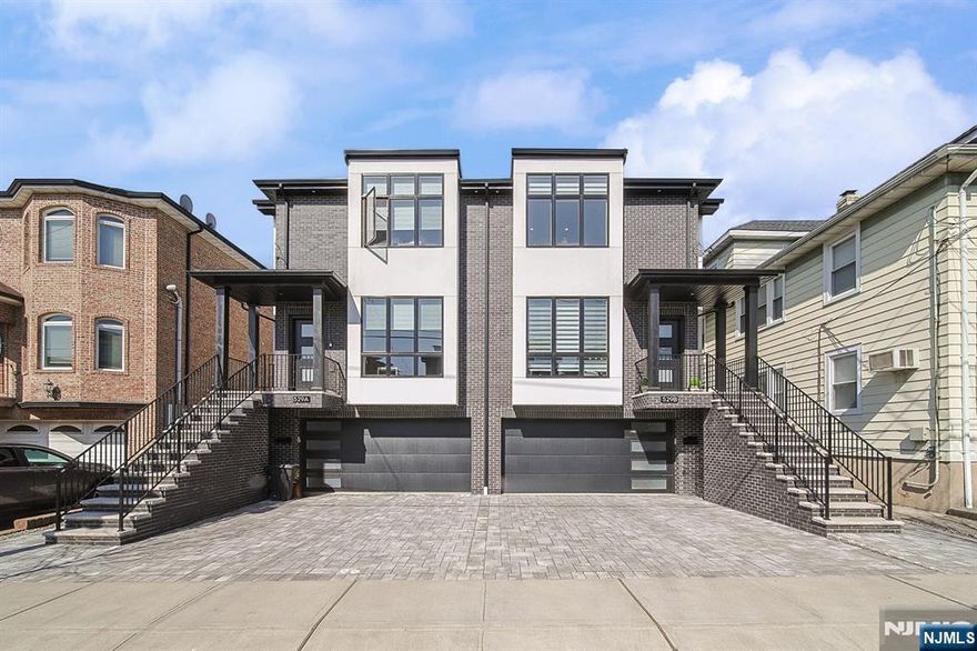 Location, Location, Location. Welcome to this beautiful 2.5 year-old duplex. It's one block from broad Ave, with an open concept layout ideal for modern living. Conveniently located near shopping, NYC transportation, and major highways. This home won't last long.