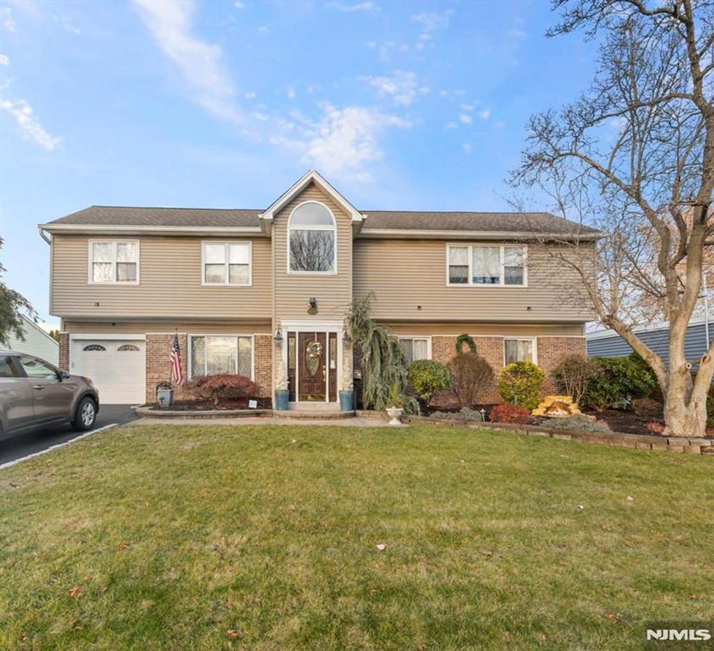 Photo of 302 Howland Avenue, River Edge, NJ 07661 (MLS # 25032677)