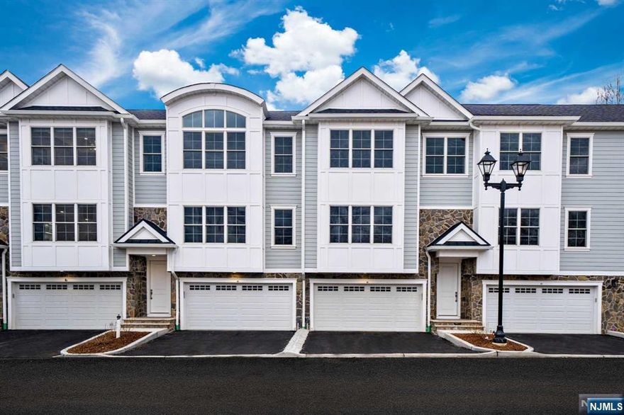 Stunning townhome at Lakeshore Estates, a beautiful new community. This spectacular Cardinal Model has been meticulously maintained since ownership. GORGEOUS INTERIOR DESIGN throughout. Beautiful custom trimwork. 3,317 sq. ft. of luxurious living space on 3 floors. 3 bedrooms, 2 full bathrooms & 2 half baths. 2 car garage, Chef's Kitchen with massive center island. Sumptuous Owner's Suite with 11 ft. tray ceiling & 2 huge walk-in with custom closet systems. Large Living room with built-ins & contemporary fireplace. Community is only 1 year young! Nearby bus & train service to Manhattan in under an hour. TOP-RATED Blue Ribbon schools... Northern Valley Regional High School ranked among the top 20 in the nation. Small town charm, parks & greenery. Experience the extraordinary inultra-desirable HAWORTH!