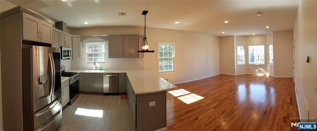 Rental Property at 214 6th St 1, Harrison, New Jersey - Bedrooms: 3 
Bathrooms: 3 
Rooms: 8  - $3,800 MO.