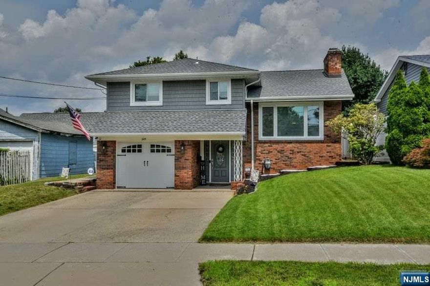 Large Sugar Maple Split with numerous upgrades. The home offers an entrance foyer, family room with a full renovated bath in 2022. Main floor offers a Living room with fireplace, Dining area, Kitchen and Sliders to the deck. Second floor offers 2 bedrooms with a full bath renovated 2022, and a master bedroom with a full bath renovated 2022. Full finished basement with fireplace, one car garage, patio and a nice yard. Central Air was replaced in 2020,New Ductless Air on the ground floor, Roof was replaced in 2021, New garage door 2022 New floors on the ground level and the basement 2022, Hot water heater 2018, Siding 2020 and Smart sprinklers 2020.