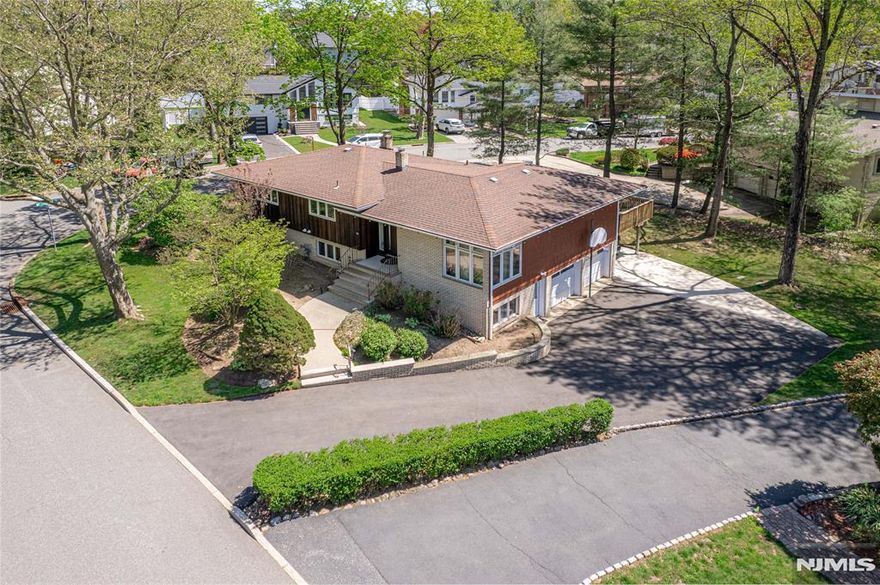 ***CALL/TEXT WAYNE @ 607-239-0541 FOR A PRIVATE TOUR***Welcome to 184 Jenkins Dr, a well-appointed 4-bedroom, 3-bath home on a corner lot offering generous space, natural light, and a convenient layout in one of Englewood Cliffsâ€™ most established residential areas. This thoughtfully designed home features hardwood flooring, expansive living and dining areas, and large windows throughout. The kitchen includes ample cabinetry and modern appliances, ideal for everyday living and entertaining. The primary suite includes a private bathroom and plenty of closet space, while three additional bedrooms provide flexibility for various lifestyle needsâ€”whether for guests, work-from-home, or personal space. As a corner lot, this property offers added privacy and light, along with outdoor space for relaxation. The well-kept exterior and private deck create a welcoming atmosphere for enjoying time outdoors. Conveniently located near local businesses, transportation options, and community amenities, this home presents an excellent opportunity to enjoy comfortable living in a sought-after northern New Jersey location.