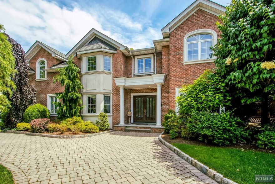 BEAUTIFULLY APPOINTED 6 BEDROOM, 6 FULL AND 3 HALF BATH HOME LOCATED IN THE NORTH CLIFFS ON APPX. .62 OF AN ACRE WITH A SPECTACULAR POOL & CABANA! AMAZING FLOOR PLAN FOR EVERYDAY LIVING AND ENTERTAINING! FEATURING A LARGE GREAT ROOM WITH FP, MUSIC ROOM AND WET BAR, OVERSIZED DINING RM W/BUTLER'S PANTRY, GOURMET KITCHEN W/BREAKFAST AREA FLOWS EFFORTLESSLY INTO THE FAMILY ROOM, HOME OFFICE W/FRENCH DOORS, PRIMARY SUITE W/SITTING ROOM W/FP, SPA-LIKE BATH W/RADIANT HEAT, 4 EN SUITE BEDROOMS, LARGE LOWER LEVEL WITH SPACIOUS REC AREA, THEATER, BALLET/YOGA ROOM, OFFICE, EN SUITE BR, HALF BATH AND ABUNDANCE OF STORAGE. FABULOUS OUTDOOR OASIS FOR ENTERTAINING, LARGE PATIO, BUILT-IN BAR W/DCS GRILL, POOL & SPA, CABANA W/ HALF BATH, CHANGING ROOM, SUMMER KITCHEN AND OUTDOOR SHOWER. GORGEOUS LANDSCAPING W/SPECIMEN TREES & LAWN AREA TO PLAY. FULL HOUSE GENERATOR, SECURITY/CAMERA SYSTEM, INDOOR/OUTDOOR SOUND SYSTEM...TOO MANY UPGRADES TO LIST. LOW ENGLEWOOD CLIFFS TAXES & CLOSE TO NYC!