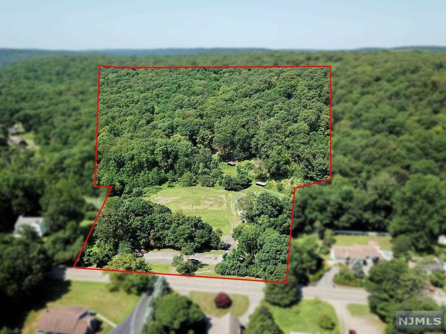 Full featured Horse Farm, ideal for an equestrian business, on 9.14 Acres assessed and preserved as Farmland ( per owner) and that offers 2 Barns with 16 stalls, room in the hay loft for 600 bales, heated Tack Room with bath, and plenty of open, lit property for an outdoor arena. Footings and cleared area in place for a 90' Pole Barn. There are multiple watering areas and paddocks, a wooded Turnout at the rear of the property, and an outdoor Wash Station with a concrete pad and drain. Barns are freshly painted, and roofs recently redone. The 2 level Chalet offers vaulted ceilings, a wall of windows, an open floor plan, hardwood floors and a wrap-around deck, plus a lower level that is ideal for a Caretaker, with separate entry, 2 bedrooms, and a full kitchen and bath as well as several other rooms. Town record shows 2 bedroom septic. Minutes to Route 23, and a wonderful opportunity.