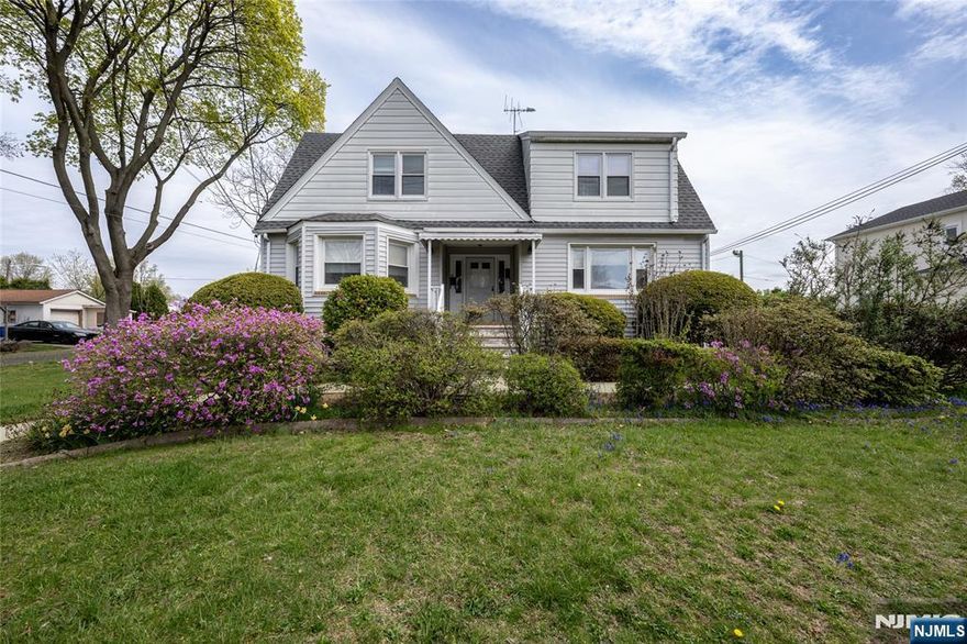 Welcome to this incredible legal two-family home on a quiet street in a great neighborhood in Clifton! This spacious home offers nearly 3,000 sqft of living space without including the massive full finished basement that has the third full bathroom! Enter through the front door into the foyer to get into the second floor unit. This unit offers two spacious bedrooms with hardwood floors throughout with tons of closet space! There is also a full bath, large living room and a spacious eat-in kitchen with access to a balcony! The first floor unit has an entrance on the side of the house and offers two large bedrooms, a den/office area and a living room along with an eat-in kitchen and full bath! The first floor unit also has access to the full finished basement which has another full bath and plenty more living space! This home is situated on a corner level lot! Don't miss out on this fantastic investment or owner occupied opportunity!