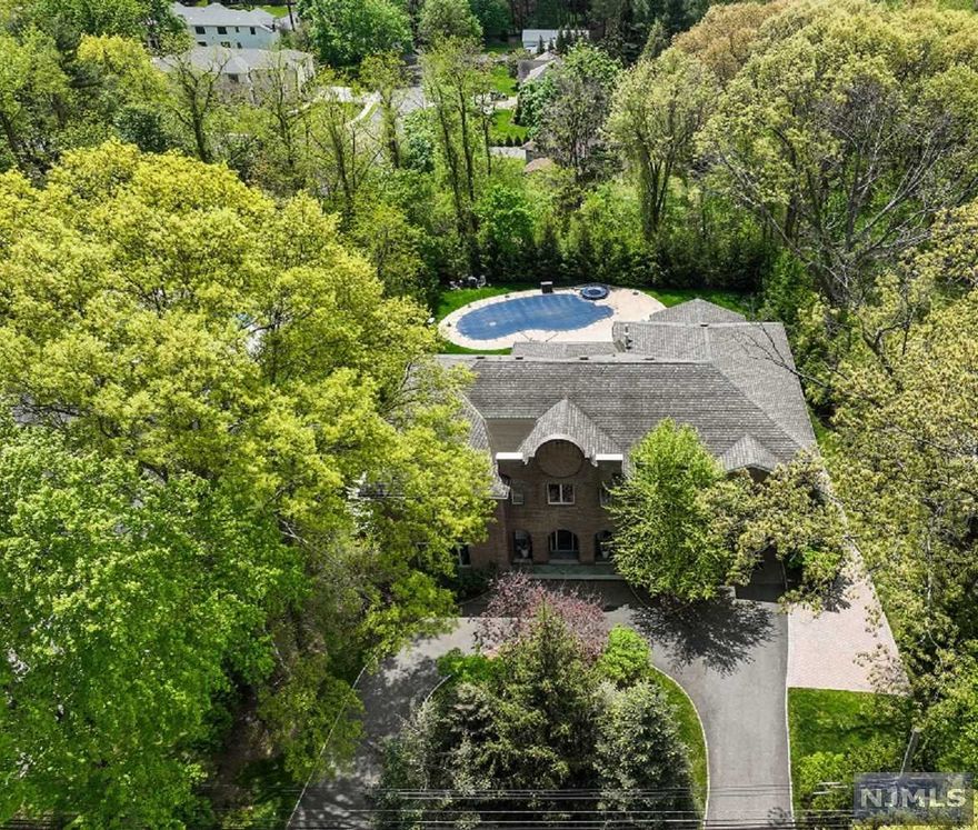 Custom Built (Approximately 9,000sf) Contemporary-All Brick 7 Bedroom/6.5 Bathroom, Open & Airy Completed In 2014 By A Renowned Local Builder Situated On Private .60 Acres (125'x209').Offering Modern Luxury Living On 3 Floors w High End Materials.Huge Open Concept Custom Kitchen w Family Rm, Fplc, Coffered Ceiling, Commercial Grade Wolf & Miele Appliances ,Custom Cabinetry & Butlers Pantry. FDR w Double Tray Ceilings w Rope Lighting, Great Rm w Fplc, 1st Floor Guest Ensuite, Multiple French Doors Onto Patios & Private Yard W Heated Salt Water Gunite Pool & Separate Hot Tub. Huge Primary Suite W Sitting Rm, fplc, Dressing Rm,Spa Bath & French Doors to Balconies. Walkout Lower Level W Lrg Rec Rm, 2nd Full Kitchen, Bedroom, Fbth, Media Rm & Lndry. Porcelanosa Tiles, Quartz Countertops, Custom Closets, 10'6' Ceilings Throughout & Much More. An Absolute Must See For Any Discerning Buyer! Pls See Virtual Tour, Floor Plans & Fact Sheet For Full List Of Features & Location Of All Rooms.