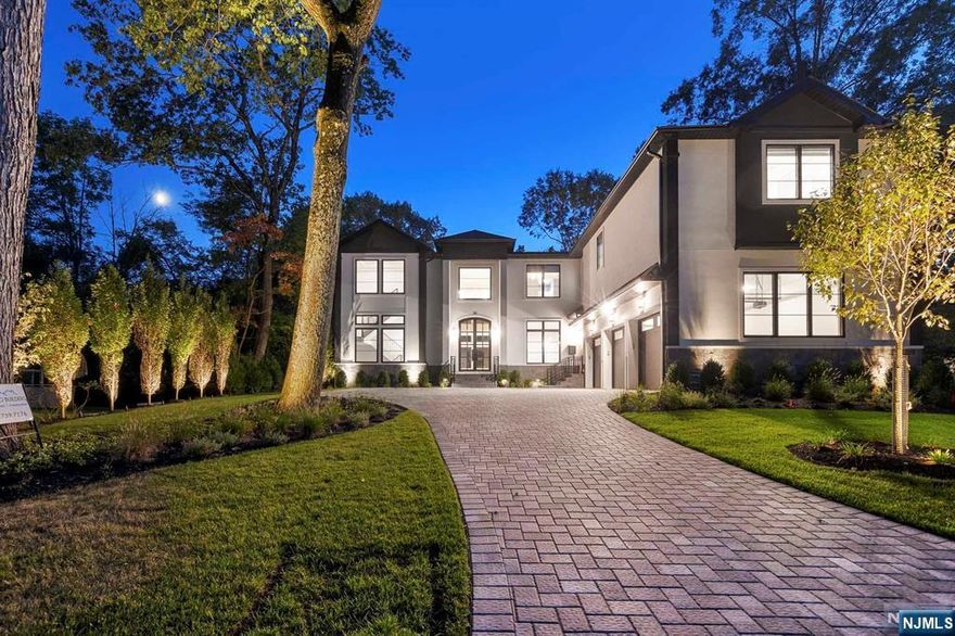 Incredible Brand New Construction on Closter's gorgeous East Hill. Huge piece of land in Prime location on a quiet cul-de-sac, very close to Ruckman Park, the Nature Center, & fine dining. This L shaped Masterpiece Smart Home totals 8500 sq ft of luxurious living. Features include 6 Ensuite Bedrooms, 7.5 Bathrooms, double height foyer & great room, gym w sauna, prewired theatre, lutron lighting, sonos, custom kitchen, amazing master suite w giant closets, large covered patio w outdoor kitchen & fireplace + phantom screens, 3 car garage w room for lifts. Beautiful inground pool (by SJ pools) with raised spa & waterfall overflow, motorized covers & 3 fire features. Giant fenced yard professionally landscaped w lighting & multi zone sprinkler system. Maintenance free Exterior. Whole house generator. RO System, 8 Zones of radiant heat. Watch the virtual tour video to see all features. Extremely accomplished and reputable builder. The VIRTUAL TOUR also has 3d model and floor plans