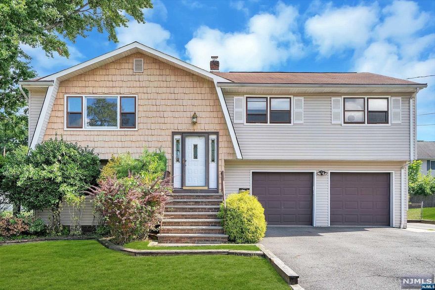 On a lovely street in Northvale, this spacious bi-level home is ready for some updating. With wood floors throughout, the first floor has a nice size living room, dining room and updated kitchen with granite counters and sliders to a deck overlooking a large fenced in yard with a shed (sold as is), the primary bedroom with door to bathroom, 2 additional bedrooms and full bath. The ground level has an additional bedroom, family room, Full Bath, Utilities/Laundry and sliders to patio. The house has a 2-car garage with remote, central air and attic storage. Great location, great schools and great town.