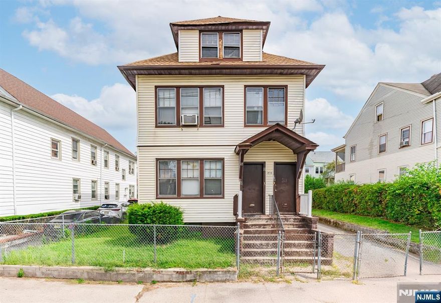This two-family home in Paterson, NJ offers great potential with a bonus unit. Featuring driveway parking and good natural light throughout, the property includes two spacious units plus a third unit, perfect as a studio, guest suite, or office. While it needs a little TLC itâ€™s fully functional and turnkey. Each unit has a practical layout with solid bones, and the home enjoys a welcoming feel thanks to large windows and a comfortable flow. A great opportunity in a convenient location.