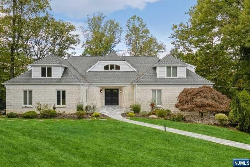 Located in the EPICENTER of Prestigious CHESTNUT HILL, this home is in a Class of Its Own with 7 Bedrooms, 6 1/2 Bathrooms, 3 CAR- GARAGE, .88ACRES and Stunning COLORADO SUNSET Views. This Perfect MULTI-GENERATIONAL Layout offers TWO MASTER EN-SUITES on the MAIN LEVEL. 2nd Level Hosts 4 Bedrooms and 3 full bathrooms (Total of 5 En-suite Bedrooms). Front-to-Back RENOVATED SHABBY CHIC Eat-In-Kitchen w/Stone Faced Fireplace, TONS of NATURAL LIGHT thru Wall of Windows & Slider to Deck overlooking LUSH PRIVATE backyard. WALK OUT Finished Basement with Recreation Room, Bedroom#7 w/Full Bathroom and Easy-Access to PAVER PATIO, Ideal for Entertaining! This is what we call in the Industry a WELL MAINTAINED Home! MOVE RIGHT IN and ENJOY LIFE in LIVINGSTON, a Top rated school district.