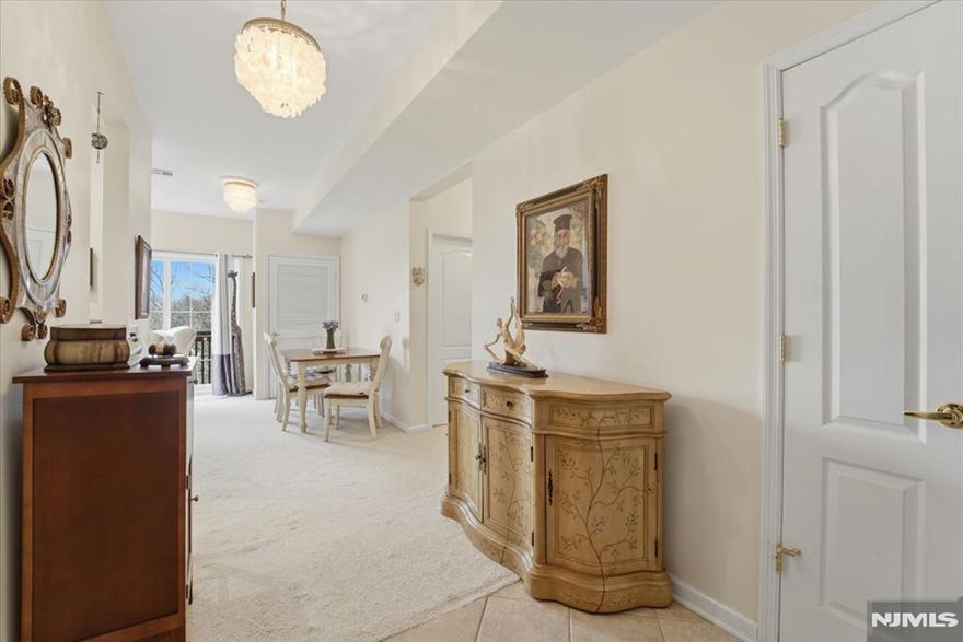 Welcome to Mountain Ridge Towers! Nestled on top of Garret Mountain, this updated 1st floor END UNIT has breathtaking views of the skyline from its private balcony! This 55+ building has ample parking, a library, an exercise room, a billiard room, an activity room. The pinnacle of this Buckingham model is its tall ceilings, wide foyer entry & open balcony where you can breathe in the crisp, mountain air. This unit has an updated primary bath, vanity with 2 sinks & linen closet. Offering an ample eat in kitchen, pantry, with all appliances included and separate dining. The primary ensuite harmonizes the personal space of the primary bedroom while guests will enjoy the privacy of their own full bathroom directly across the hall from the 2nd bedroom. EXPANSIVE kitchen is the epicenter of culinary entertainment, as it opens to the dining and living rooms. Laundry Room with washer/dryer and large coat closet. Elevators for ease of mobility - no fussing over stairs! Plenty of on-site parking. Commuting, shopping, and dining a breeze! Minutes to NYC, Giant stadium, American Dream mall, golf courses, downtown Montclair restaurants and more. Move right in to this handicap accessible complex. This will not last, so let's connect today!