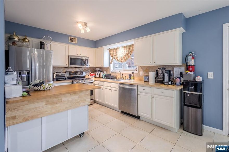 Welcome to this sough after community in the heart of the Ironbound section of Newark. Just steps to restaurants, shopping, public transportation and highways. Four bedrooms, 2.5 bathrooms, central air conditioning and forced hot air. 2 assigned parking spaces, hardwood floors throughout and much more.