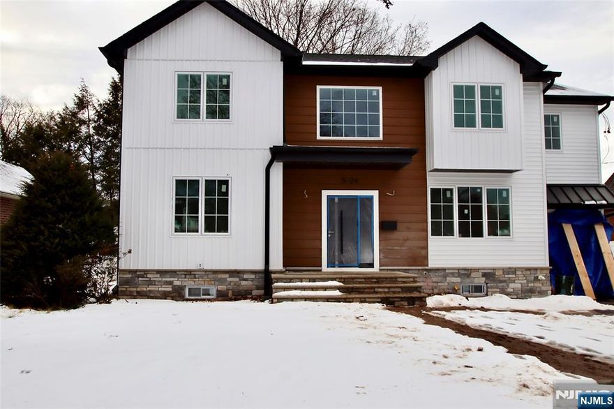 Welcome to this Stunning 5 Bedroom, 3 full bath home located in the highly sought-after Lyncrest Neighborhood. This specious home offers a perfect blend of practical living space plus the luxury for today's lifestyle - Featuring 1st floor Bedroom, Spacious Living Rm, Full Bath, Modern Kitchen with 2 sinks, 2 ovens, and 2 Dishwashers - ideal for cooking, entertaining or hosting large gatherings - flowing into large family/Dining rm. Entrance to a very spacious Backyard off Kitchen - 2nd floor has 4 Generous-size Bedrooms (Primary has walk-in closet and full bath) and Main Bath - Basement is fully finished offering additional living space. - 2 heating a/c units -Entrance to Garage from first floor - Enjoy all the amenities Fair Lawn has to offer such as a town man made pool with a park, dog park, street hockey, pickleball, Basement ball etc, Community center with inside walking path, Plays and many programs - Walk to Schools, parks, Houses of Worship &, NY Trans - Fair Lawn has 2 train stations