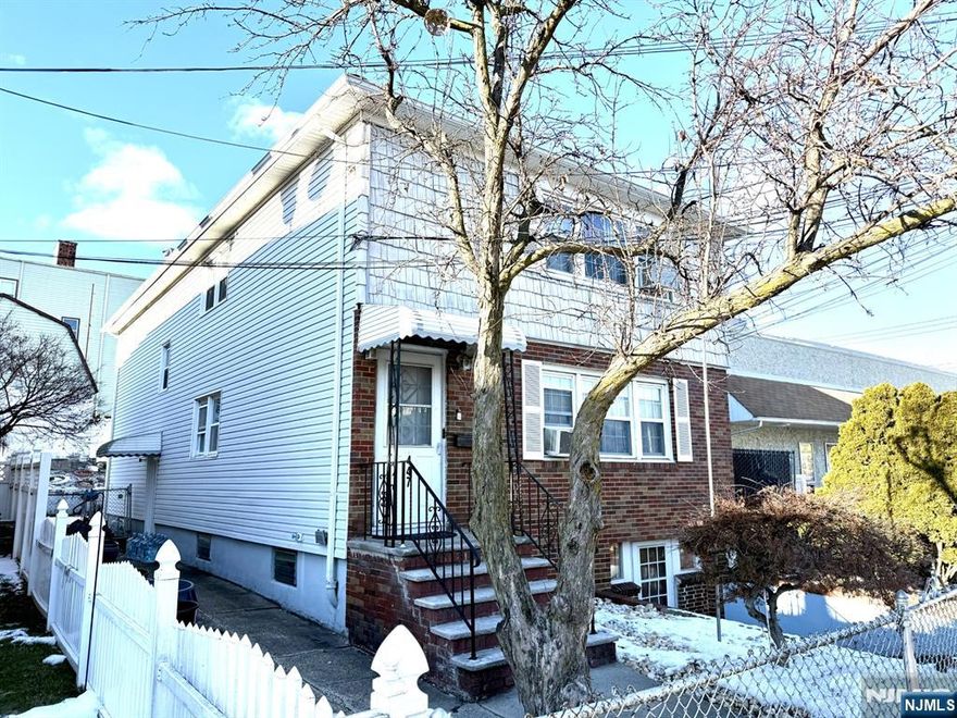 Brand new listing! Charming two family home in the desirable Arlington section of Kearny. This two family home offers identical spacious units, each featuring hardwood floors throughout, a large living room, 3 bedrooms, and a full bathroom. The full semi-finished basement provides incredible bonus space with 3 additional rooms, ample storage, and endless potential for a recreation area, home office, etc. Recent updates include a new rood stalled in 2018. Step outside to a large shed in the rear yard with a roll-up door. This home is just minutes away from convenient access to public transportation options. Easy access to NYC such as nearby path station and NJ Transit buses. Separate Gas meters for efficient utility management; separate electric meters. Don't miss this rare find in one of Kearny's most sought after-areas.