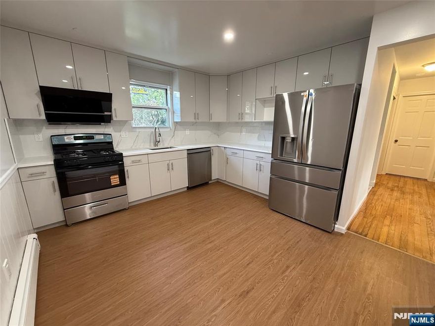 Spacious and newly renovated rental available in Lodi, NJ. This unit features a freshly painted interior, a clean modern layout, and impressive room sizes throughout. The oversized living room measures 222.5 x 208, providing plenty of space for entertaining and everyday living. The primary bedroom offers a comfortable 207.5 x 146.5 layout, while the second bedroom measures 161 x 146.5â€”both with ample closet space. Additional highlights include in-unit laundry, mini-split systems for efficient heating and cooling, and brand new finishes throughout. Off-street parking is available with one dedicated spot in the driveway. A move-in-ready home offering both comfort and space in a convenient Lodi location. Small Pet ok.