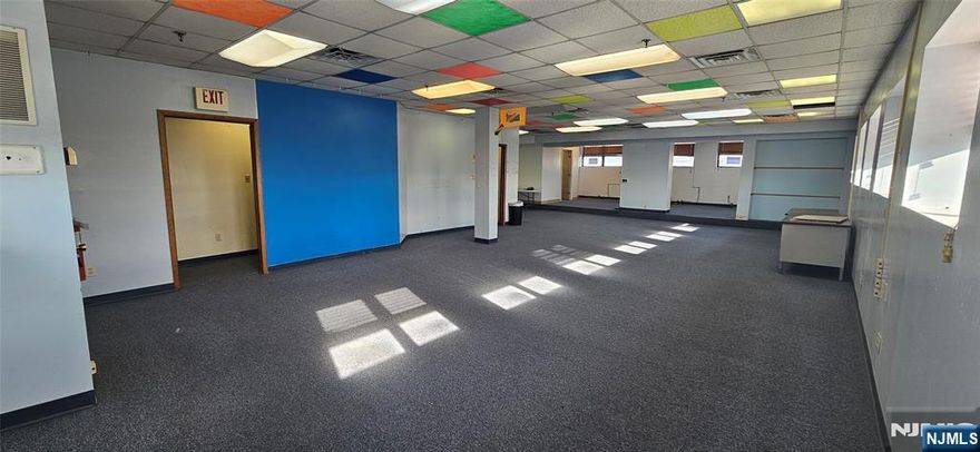 PENTHOUSE LEVEL COMMAND: PREMIER TOP-FLOOR NEWARK OFFICE. Elevate your professional presence to the top floor of 1019 Broad Street. This 2,370 sq ft full-floor Penthouse Suite offers the ultimate professional footprint in the heart of Newark's rapidly revitalizing Tech and Finance District. THE PENTHOUSE ADVANTAGE: Anchored by the highly stable Newark Teachers Union, this top-floor suite features an open-concept layout and wraparound windows that flood the space with natural light and expansive city views. Includes elevator access, stair access, and two private lavatories. Zoned C2â€”perfect for a law firm, tech headquarters, or executive center. THE ASSETS: Rare and valuable THREE (3) ASSIGNED PARKING SPACES INCLUDED in the rent. Located in a premier transit corridor with NJ Transit, Newark Light Rail, and PATH trains to Manhattan steps from your door. Just 13 miles to the Holland Tunnel and 4 miles to Newark Liberty International (EWR). DOWNTOWN COMMAND: Directly across from Newark Symphony Hall and NJPAC. You are minutes from the Essex County Courthouse, Federal Building, Prudential Center, Rutgers University, and NJIT. LEASE TERMS: Immediate occupancy available. Minimum 3-year lease (up to 10 years preferred). POSITION YOUR BRAND AT THE PEAK. Schedule your private penthouse tour today. Prospective tenants are advised to verify all intended business usage with the Newark Zoning Department at (973) 733-6333.