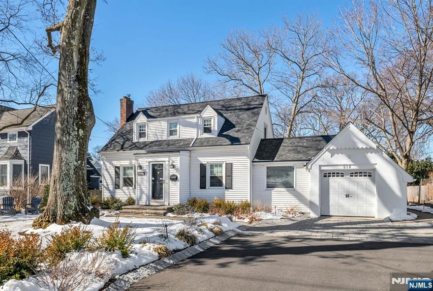 What a wonderful chance to get into the fantastic town of Glen Rock! This bright and charming cape offers great space and so many attractive updates! From a pretty entry foyer, you reach the sunny living room with wood burning fireplace and handsome surround. The formal dining room with chair rail detail opens to a spacious kitchen with a center island and an adjacent den that could also be an oversized mudroom area. A convenient bedroom rounds out the first floor, while two additional large bedrooms are upstairs, along with an updated bath. The newly finished lower level adds a great recreation space, along with another full bath. The large, flat backyard is a huge plus, with close access to town, train, and schools. Recent updates include roof, gutters, windows, landscaping, sprinklers, driveway, garage door, interior painting, refinished HW floors and more!