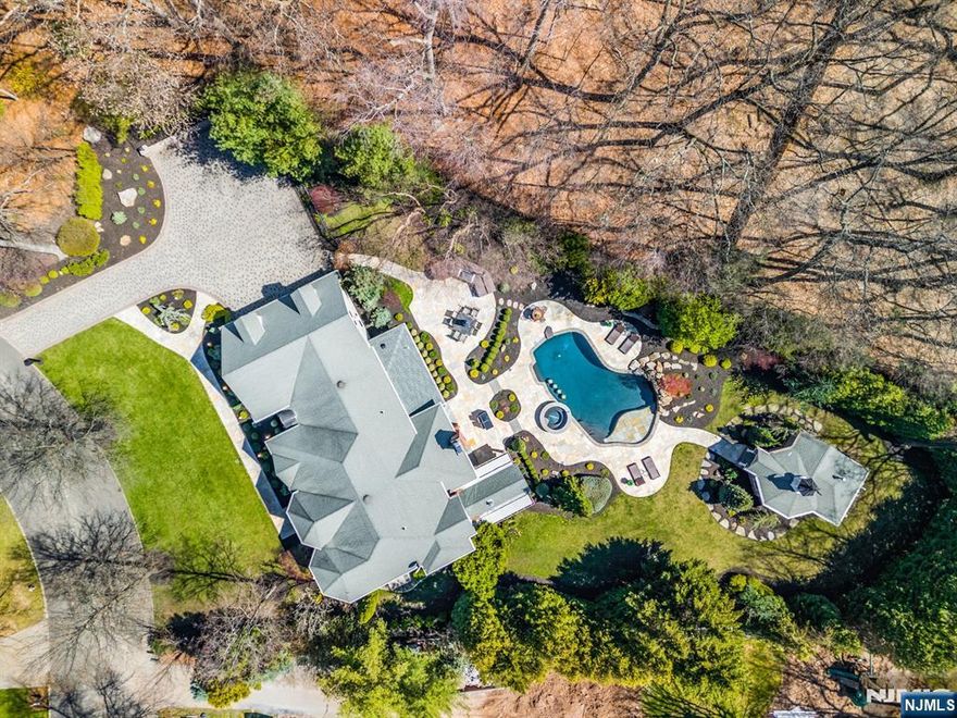 Set on a beautifully landscaped and fully fenced 0.73-acre property in Wyckoff, this incredible home presents an exceptional blend of refined design, modern luxury and resort-style living. This impressive residence, with a fully finished lower level, has been thoughtfully and professionally redesigned with meticulous attention to detail. A stunning kitchen expansion completed in 2024 serves as the heart of the home, offering both elevated style and everyday functionality. The residence features five spacious brs including the primary ensuite with an extraordinary new spa bath (2024), a dedicated private office, and four and a half beautifully appointed baths. The lower level is an entertainerâ€™s dreamâ€”complete with wet bar with refrigeration, a gorgeous temperature-controlled wine room (2021), a gym and a newly added sauna (2025). Outdoor living is equally extraordinary. A newly renovated pool house (2025) offers a cabana-style kitchen and bath, perfectly complementing the gorgeous gunite pool with sun shelf and spa. The grounds are designed for seamless entertaining, featuring an outdoor kitchen with stone countertops and a covered patio anchored by a gas fireplace w/ copper hoodâ€”ideal for year-round enjoyment. Add'l highlights include a full-house generator, a whole-house water softener and the convenience of municipal water and sewer + shopping, schools and transportation all nearby. You can have it all in this stunning home. Highest & best offers by Thurs 4/16 11am.