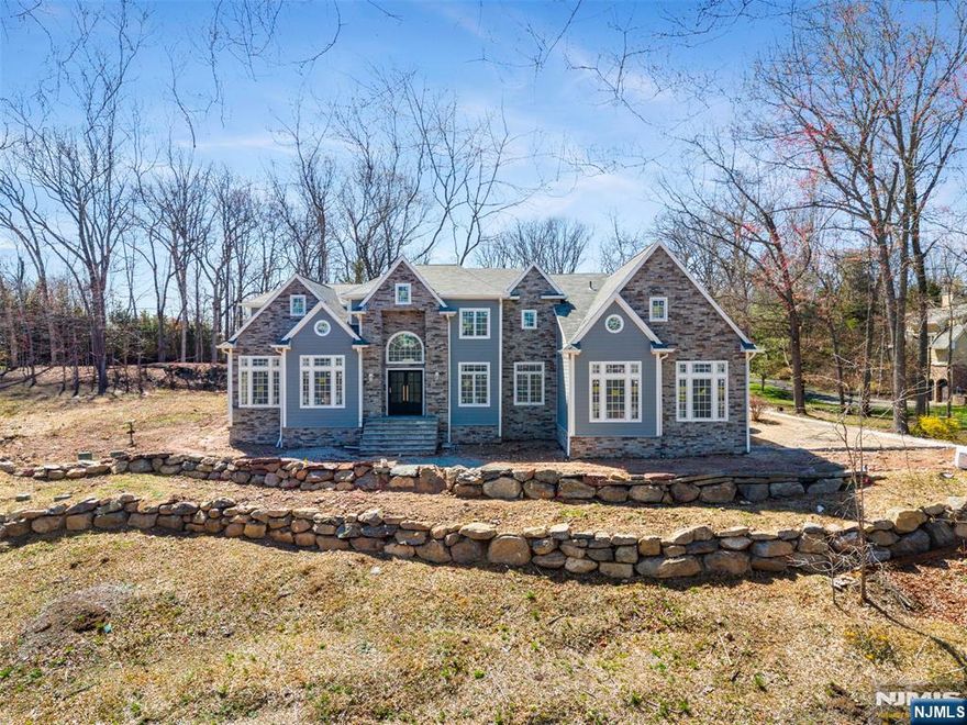 You simply wonâ€™t find brand new construction like this in Franklin Lakes. Act quickly before itâ€™s gone. Welcome to this exceptional new construction colonial set on a full acre in one of Franklin Lakesâ€™ most desirable locations. Offering approximately 5,500 sq ft of beautifully designed living space, and approximately 3,000 sq ft in the basement. This is one of the best opportunities currently on the market in terms of location, value, and square footage. The first floor features a grand two-story foyer and a stunning two-story great room, creating an open, airy feel with incredible natural light and seamless flow throughout. A formal living room and formal dining room provide elegant entertaining spaces, while a versatile study, ideal as a home office or 5th bedroom, adds flexibility. The custom kitchen is the centerpiece of the home, designed for both everyday living and entertaining, and is complemented by a convenient first-floor laundry room. Upstairs, the second level offers a well-designed layout with two bedrooms connected by a Jack & Jill bathroom, an additional en-suite bedroom, and a spacious primary suite with a beautifully appointed bath. Custom trim work throughout enhances the homeâ€™s classic colonial character, adding warmth and sophistication to every space. The finished basement adds valuable additional living space. A rare chance to secure a brand new home on a private acre in Franklin Lakes.