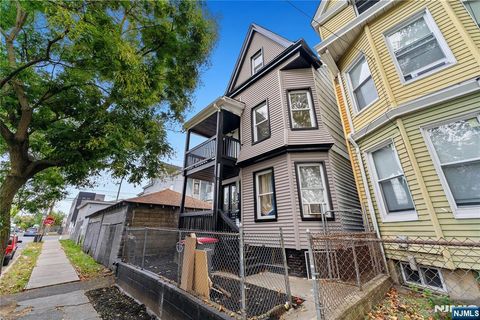 Photo of 128 Keen Street, Paterson, NJ 07524 (MLS # 25034232)