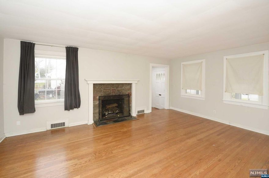 CHARMING AND NEWLY RENOVATED HOME ON DESIRABLE GLEN ROCK STREET, NEAR TO BUS/TRAIN, DOWNTOWN, LIBRARY AND BLUE RIBBON GLEN ROCK SCHOOLS. OPEN CONCEPT MAIN FLOOR FEATURES SUNNY LIVING ROOM WITH FIREPLACE, DINING ROOM, MODERN EAT-IN KITCHEN WITH STAINLESS STEEL APPLIANCES, MARBLE COUNTERS, FARMHOUSE SINK AND ELEGANT CONTEMPORARY STYLE. MASTER BEDROOM, HALL BATH AND ANOTHER BEDROOM ALSO ON THIS FLOOR. FRENCH DOORS LEAD TO A DECK AND BACK PATIO AREA IN A SPRAWLING, DEEP LOT MARKED BY PARK-LIKE GROUNDS. ENCLOSED PORCH/SUN ROOM ON THE FRONT OF THE HOUSE. NEWLY RENOVATEED UPSTAIRS FIND LANDING WITH STORAGE AND OFFICE AREA, NEWLY RENOVATED POWDER ROOM AND ANOTHER LARGE BEDROOM WITH BUILT-IN STORAGE ALL NEW FLOORING AND LIGHTING . ENJOY EVERY CONVENIENCE, INCLUDING CENTRAL AIR, LAUNDRY, BASEMENT STORAGE AND OPTION FOR 1 FLOOR LIVING. HOME BEING SOLD AS IS .OWNER HOLDS A REAL ESTATE LICENSE