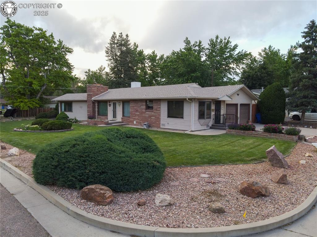 Beautiful corner lot location with well manicured yards.