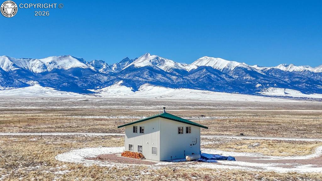 House with Sangre De Cristo's in background