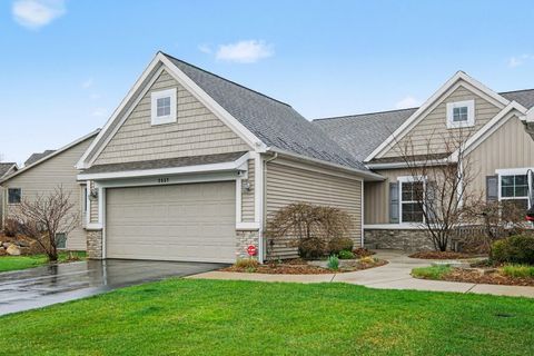 Photo of 2537 Highridge Hills Lane SE, Cascade Charter Township, MI 49546 (MLS # 65026013654)