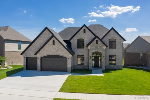 Photo of 53707 Addington Dr, Macomb Township, MI 48042 (MLS # 20261056958)