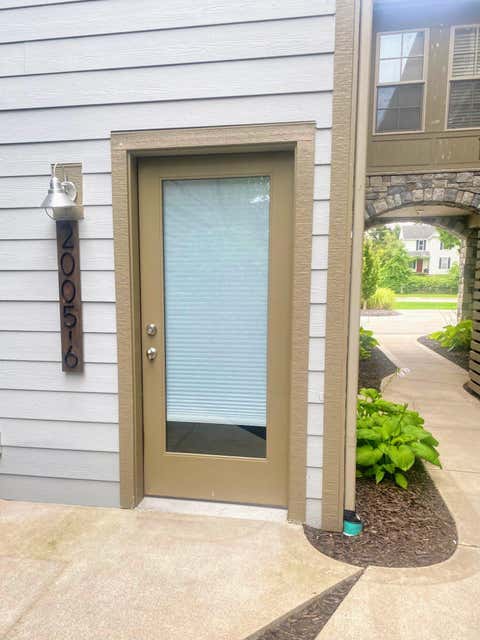 Photo of 2005 Celadon Drive NE #Unit 6, Grand Rapids Charter Township, MI 49525 (MLS # 65026044149)