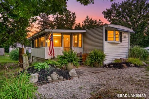 Photo of 1499 Big Lake Drive, Watson Township, MI 49328 (MLS # 65026025902)