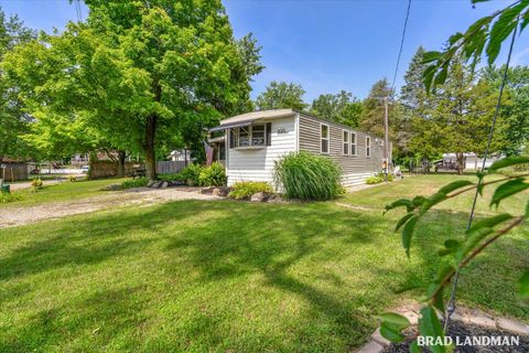 Tiny photo for 1499 Big Lake Drive, Watson Township, MI 49328 (MLS # 65026025902)