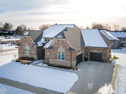 Photo of 16818 Glenhurst Drive, Macomb Township, MI 48044 (MLS # 58050196190)