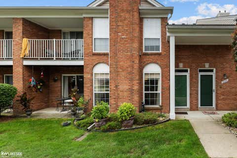 Photo of 52392 Heatherstone Avenue, Macomb Township, MI 48042 (MLS # 58050218476)