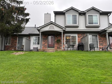 Photo of 452 Nicolet Street #6, Walled Lake City, MI 48390 (MLS # 20261029842)