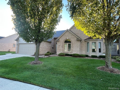 Photo of 45598 Delmar Drive #129, Macomb Township, MI 48044 (MLS # 20261077235)