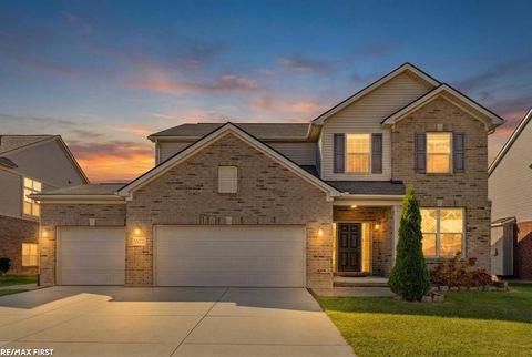 Photo of 55321 Demaret Drive, Macomb Township, MI 48042 (MLS # 58050193058)