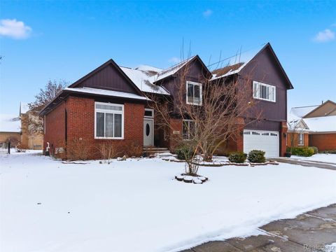 Photo of 48194 Lamplighter Trl, Macomb Township, MI 48044 (MLS # 20251059552)