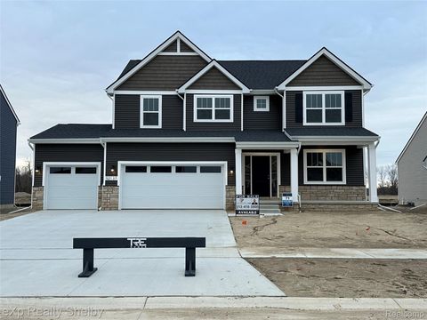 Photo of 52137 Wellington Valley Drive, Macomb Township, MI 48042 (MLS # 20251049603)