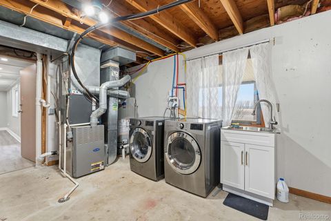 Tiny photo for 425 Lakes Edge Drive, Oxford Village, MI 48371 (MLS # 20261014598)