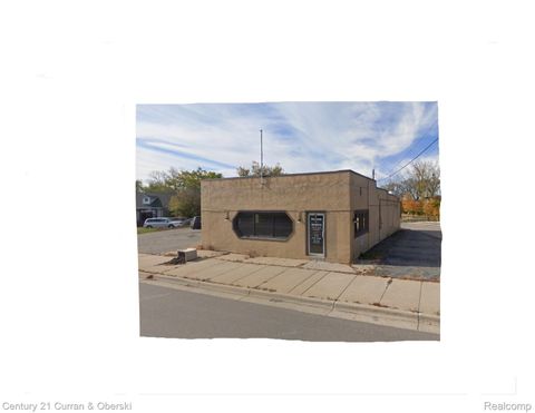 235 N Pontiac Trail Walled Lake City MI 48390