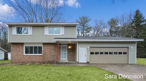 Photo of 760 E Wedgewood Drive, Laketon Township, MI 49445 (MLS # 65026013426)