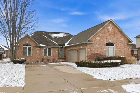 Photo of 16489 Bishopsgate Drive, Macomb Township, MI 48044 (MLS # 58050200161)
