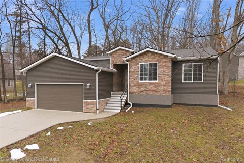 Photo of 10303 9 Mile Road, Green Oak Township, MI 48189 (MLS # 20261010265)