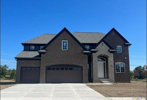 Photo of 49453 Carles Dr, Macomb Township, MI 48044 (MLS # 20261072289)