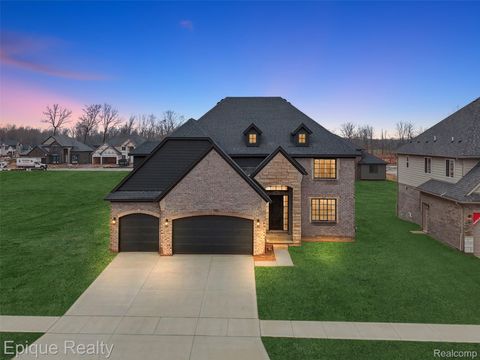 Photo of 50605 Mistwood Drive, Macomb Township, MI 48042 (MLS # 20261001041)