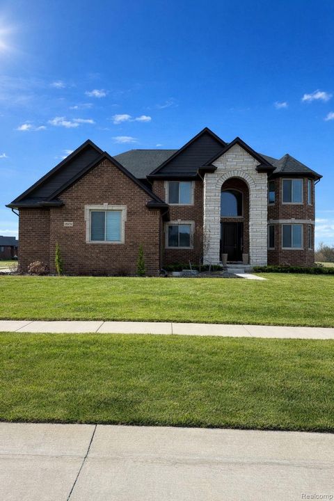 Photo of 15870 Via Manzoni, Macomb Township, MI 48042 (MLS # 20261020204)