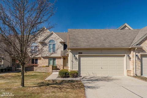 Photo of 16885 Boulder Way #66, Macomb Township, MI 48042 (MLS # 58050201907)
