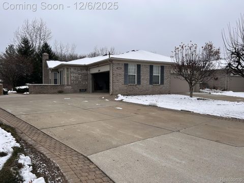 Photo of 17662 Port Salem Drive #44, Macomb Township, MI 48044 (MLS # 20251058386)